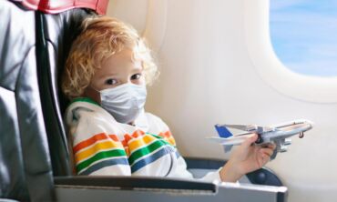 Keliaujantys vaikai iki 12 metų amžiaus nebus tiriami ar izoliuojami