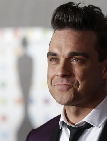 Meilę dukrytei Robbie Williamsas įamžino neįprastu būdu FOTO