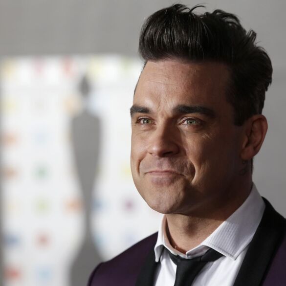 Meilę dukrytei Robbie Williamsas įamžino neįprastu būdu FOTO